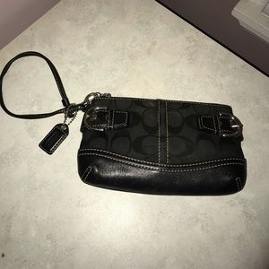 Black Coach Wristlet with buckles on sides